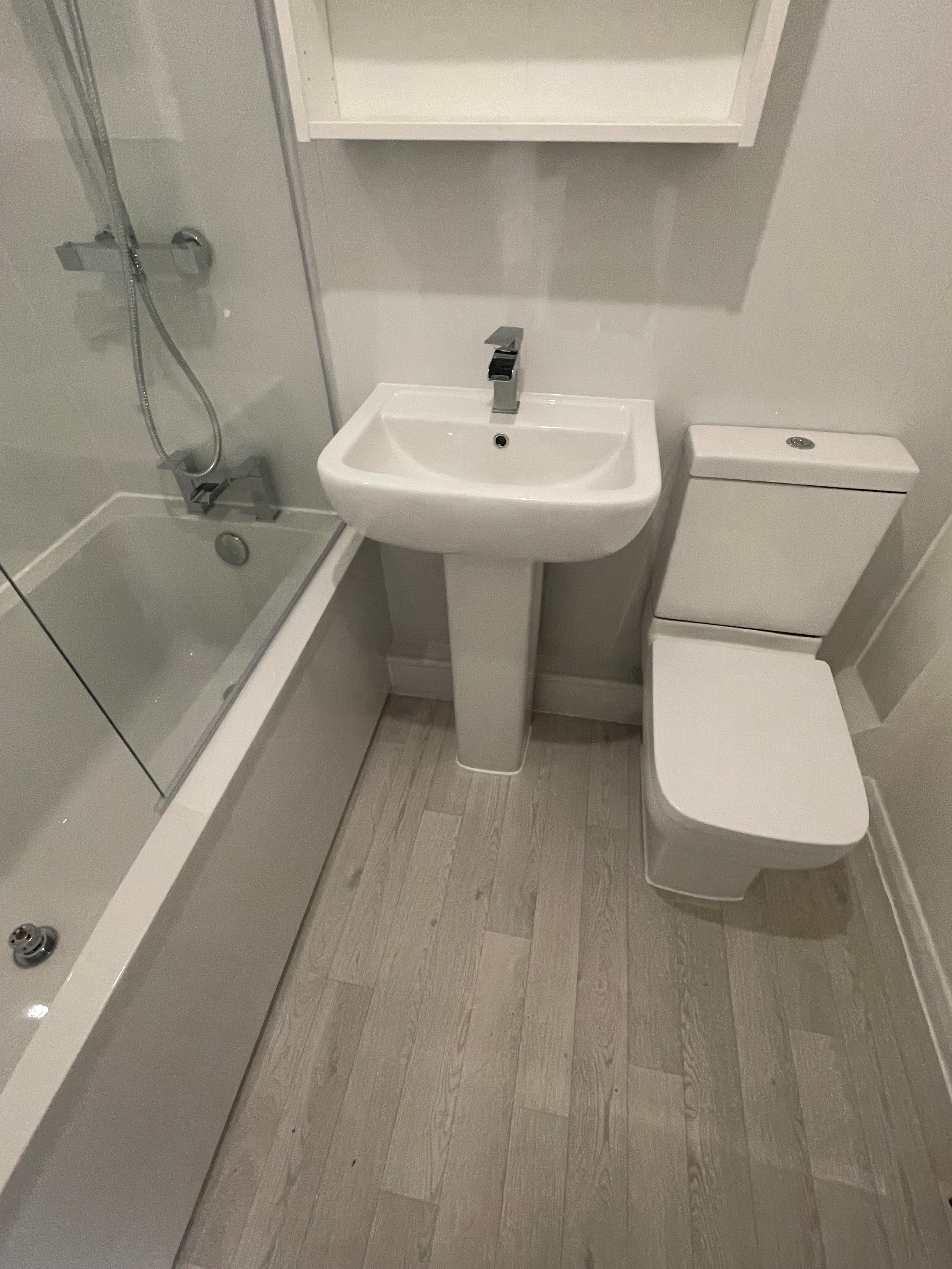 Bathroom with gloss white pvc panels